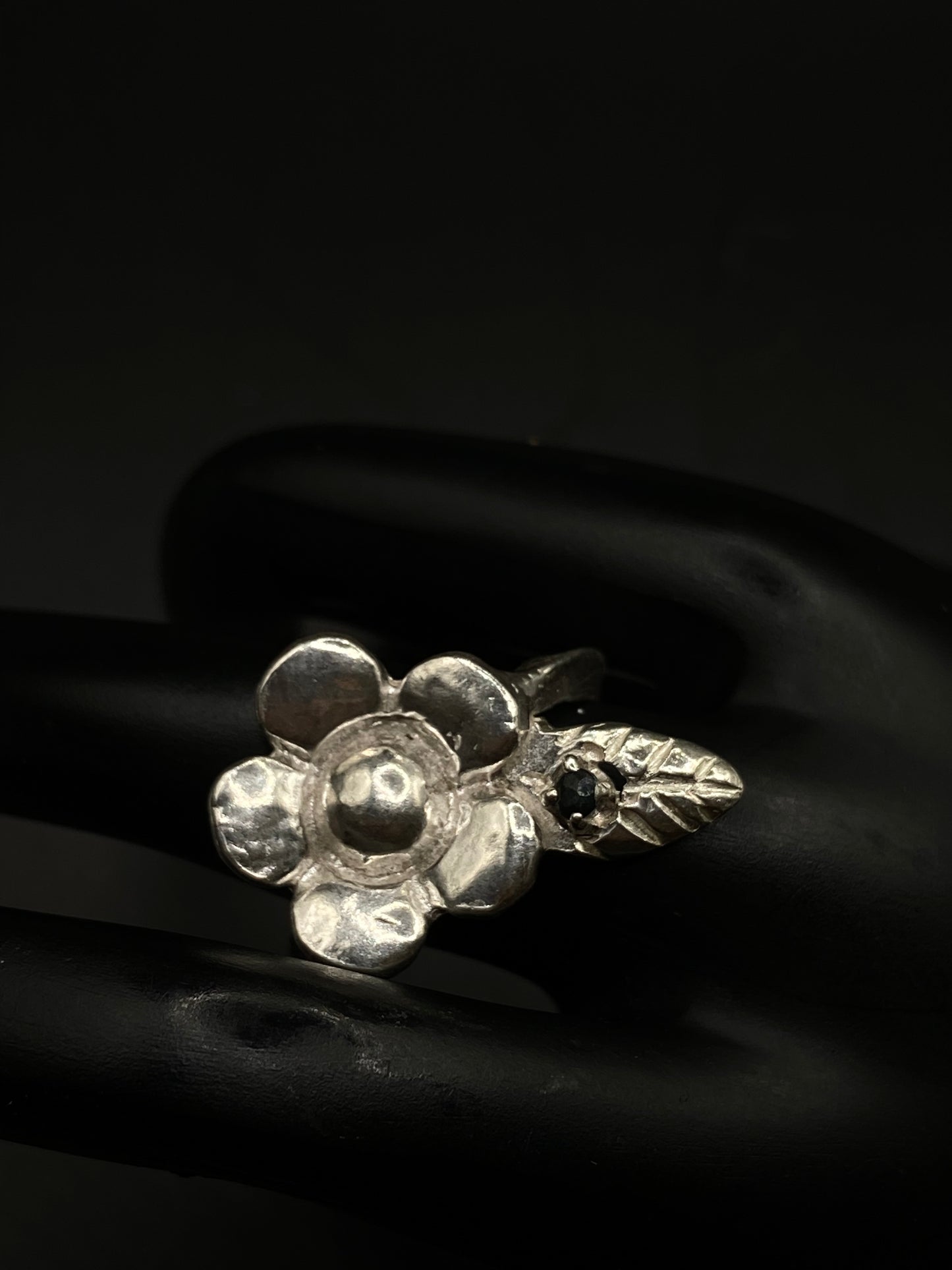 Silver flower and sapphire ring