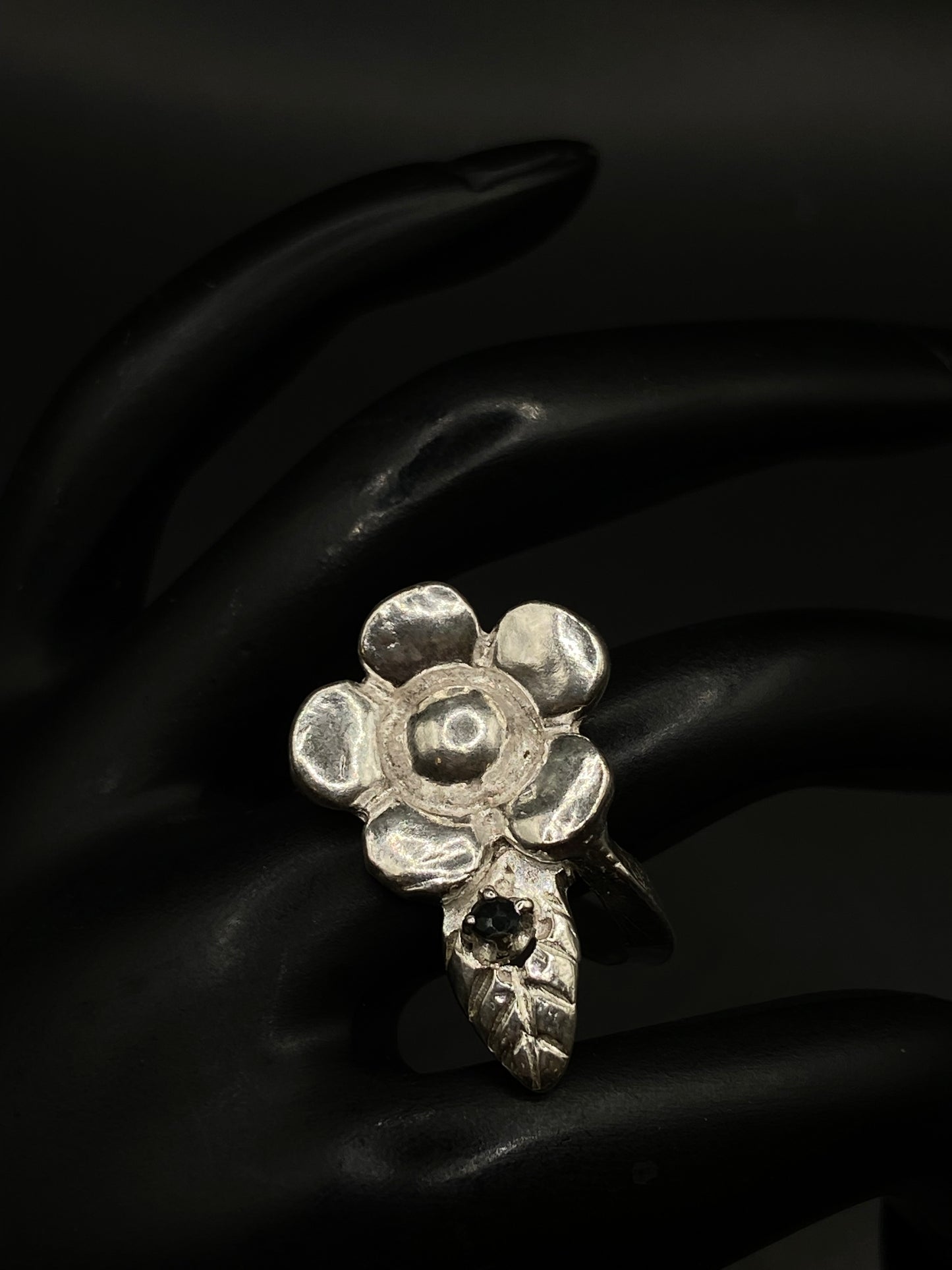 Silver flower and sapphire ring