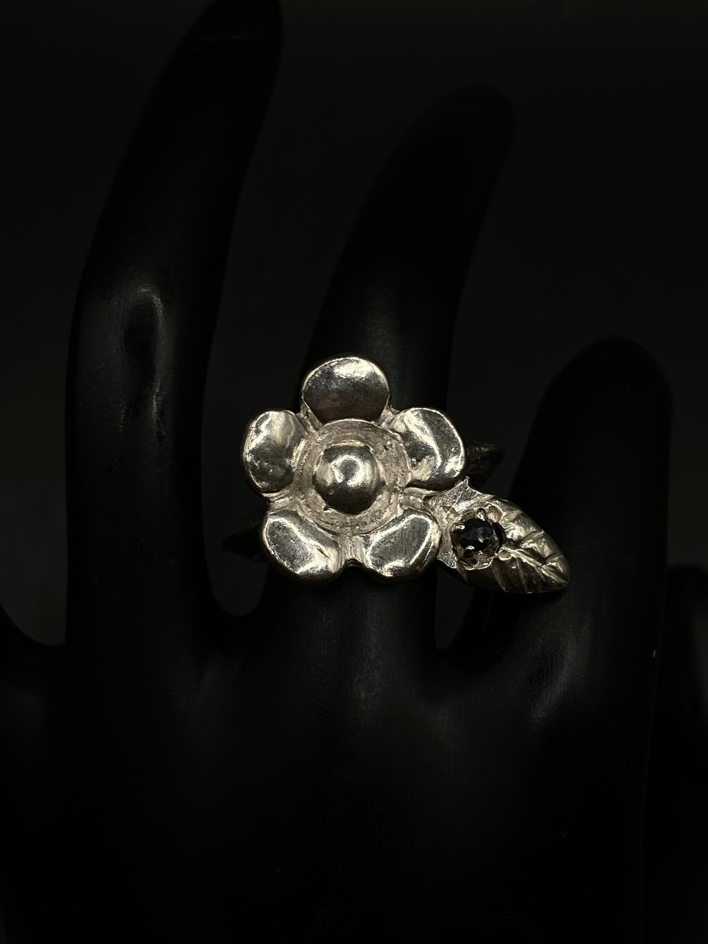 Silver flower and sapphire ring