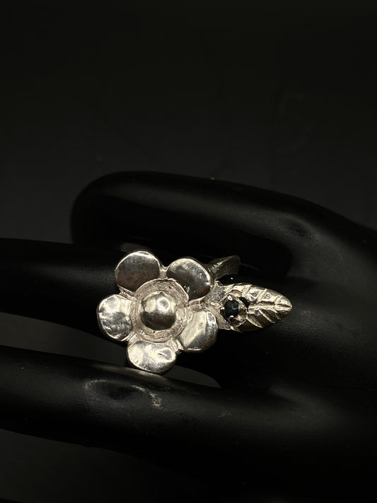 Silver flower and sapphire ring